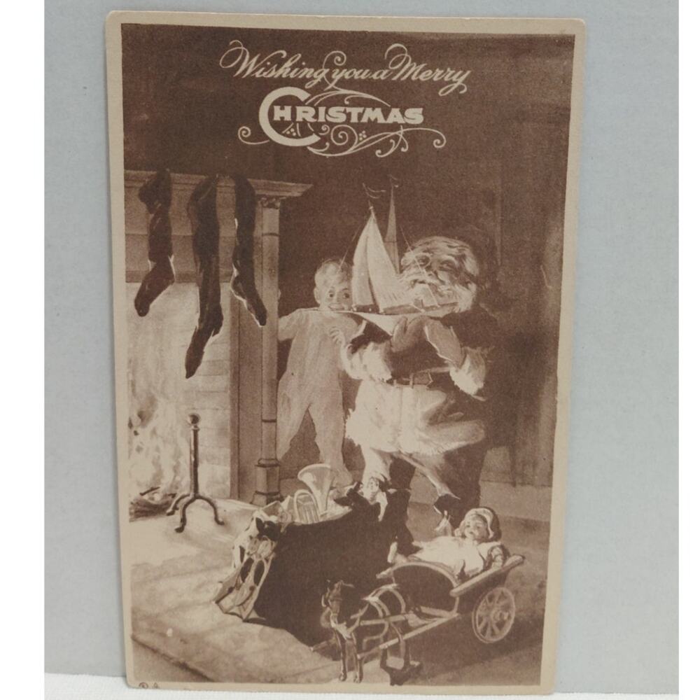 Antique Christmas Postcard Santa Claus Holding a Boat Unposted Divided